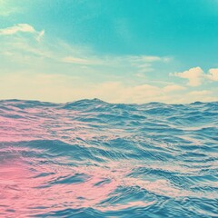 A serene view of the ocean with gentle waves under a colorful sky.