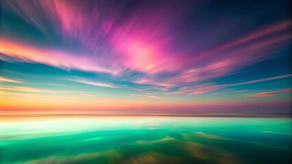 Obraz premium A symphony of colors paints the horizon, where ethereal clouds dance over a tranquil ocean, creating a dreamscape of boundless beauty.
