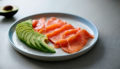 A plate of avocado and salmon slices