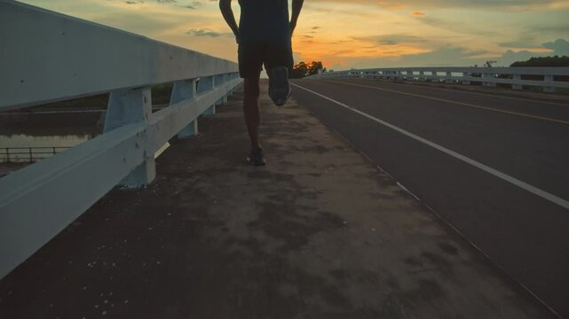 runners is running on the road at outdoors.healthy lifestyle and sport concepts.Sprinting Endurance Workout Training.running for Striding Towards the Future.The Determined Runner.