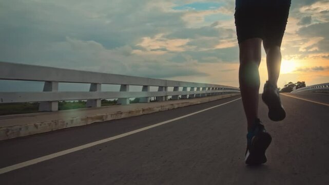 runners is running on the road at outdoors.healthy lifestyle and sport concepts.Sprinting Endurance Workout Training.running for Striding Towards the Future.The Determined Runner.