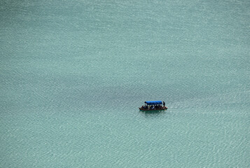 boat in the water lake bled slovenia (european travel tourism destination) castle island rent hire...
