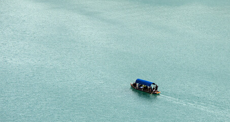 boat in the water lake bled slovenia (european travel tourism destination) castle island rent hire...