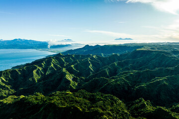 Hill landscape with blue sky and clouds