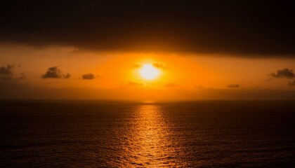 Fototapeta premium A big sun rises under the dark sky