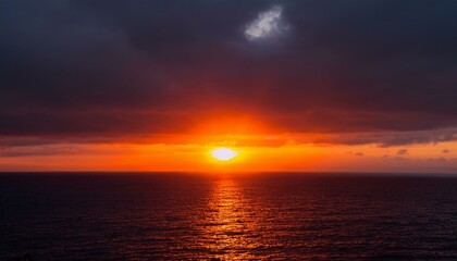 Fototapeta premium A big sun rises under the dark sky