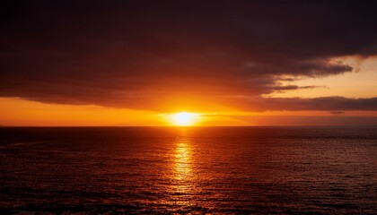 Fototapeta premium A big sun rises under the dark sky