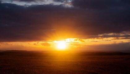 Obraz premium A big sun rises under the dark sky