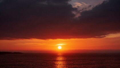 Naklejka premium A big sun rises under the dark sky