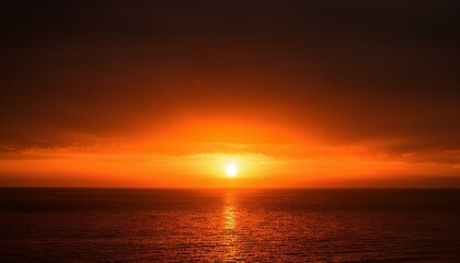 Obraz premium A big sun rises under the dark sky