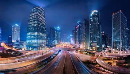 Fototapeta premium Night aerial view of modern infrastructure buildings residential city