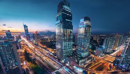 Obraz premium Night aerial view of modern infrastructure buildings residential city