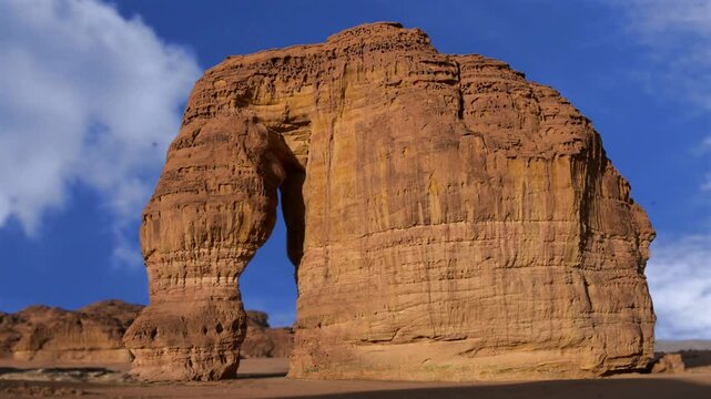 Timelapse of Elephant Rock, Al Ula, Saudi Arabia. Unesco World Heritage site, a landscape of sand, rocks Near to Hegra and a main tourist attraction. Elephant Rock (Jabal AlFil) in Al Ula Saudi Arabia