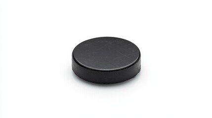 A hockey puck sliding across the ice, isolated on a white background