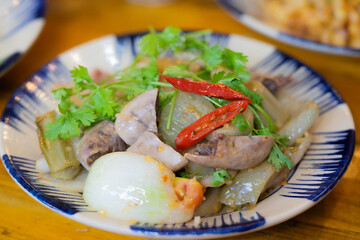 Stir-fried Pork Uterus with Cabbage. Vietnam food - Doi truong. Stir fried pork uterus with pickled mustard 