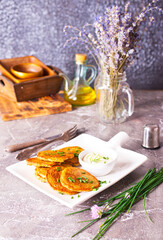 Potato pancakes on white plate