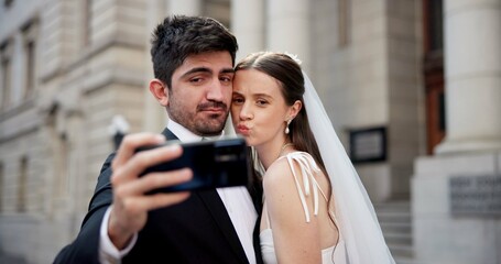 Couple, selfie and celebration with wedding in city, love or happy for commitment, memory and post on web. People, man and woman for marriage, event or funny face with smile on social media in Greece
