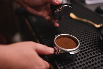 In lively cafes, the barista expertly used the machine as a tool to tamp the espresso beans, creating a rich hot drink that delivered a perfect dose of caffeine bliss.