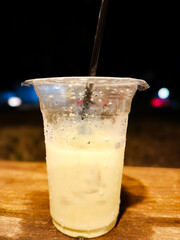 Sweet drink in plastic cup