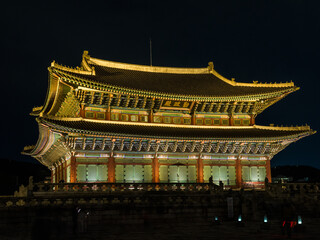 Fototapeta premium Seoul, South Korea - October.25.2024: The night view of Geunjeongjeon in Gyeongbokgung Palace