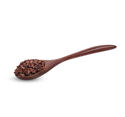 Cocoa nibs that are strong and have not undergone any processing other than roasting and shelling with a wooden spoon isolated on white background