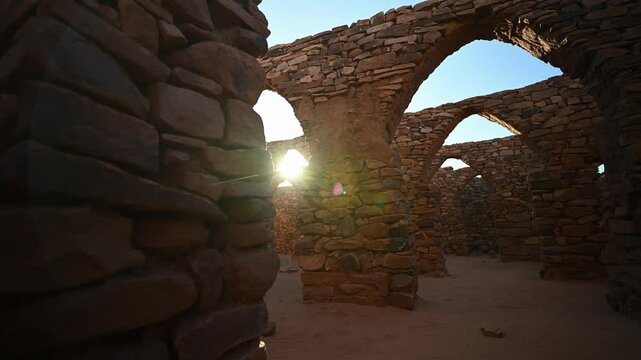 Ouadane or Wadan Old city, desert of Mauritania. First-person view, reveal shot