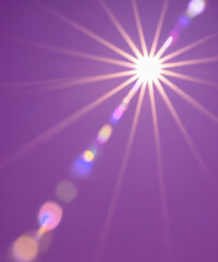 Obraz premium Sunbeam through the haze on pink sky, vertical