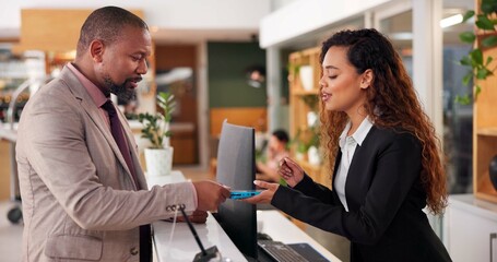 Hotel, receptionist and man with pay machine for booking, guest room service and reservation....