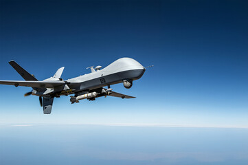 Fototapeta premium Armored military drone with missile flies in the sky. Unmanned aerial vehicle.