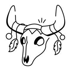 A doodle icon of a bull skull adorned with feathers and beads

