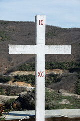 cross in the mountains in greece