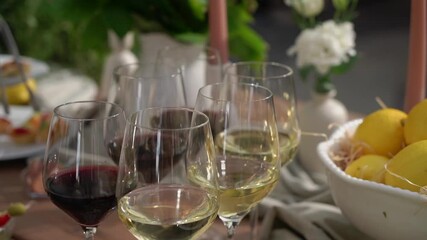 A beautifully arranged dining table that showcases wine, fresh lemons, and exquisite floral decor elements