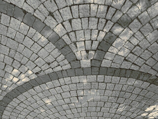 Use of cube stone in landscape application, perspective stone pavements. Square with a large dark gray circle inside a small round of cobblestone cubes. Stone background. Vector illustration.