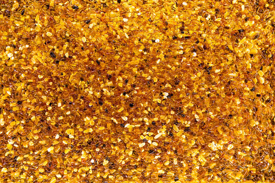 A scattering of small processed amber stones.
