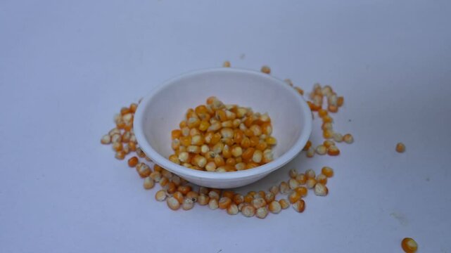 Boiled corn Chaat. Indian style corn salad that's sweet, spicy and tangy. It is mixed with chaat masala, roasted cumin powder, red chili powder, coriander leaves, onion and tomatoes. Indian snacks.