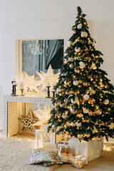 Christmas interior in a luxurious golden style with garlands in the form of stars and a mirror. Background for New Year wallpapers and postcards.