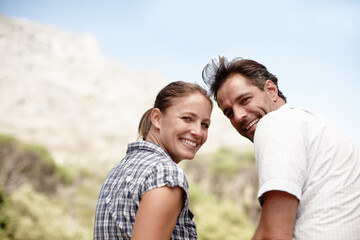 Fototapeta premium Couple, portrait and outdoor vacation on mountain, love and bonding adventure in Costa Rica. Happy people, sustainable honeymoon and together on holiday, romance and weekend trip for connection