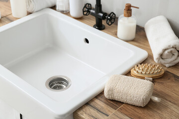 Bath accessories near sink in bathroom