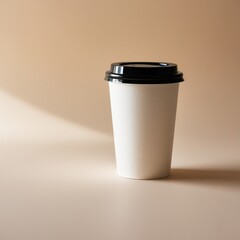 White paper coffee cup with a black lid, standing alone on a solid color background."
