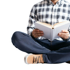 Obraz premium A Cozy Moment: A Young Man in a Plaid Shirt Sitting Cross-Legged, Engrossed in an Open Book, Capturing the Essence of Peaceful Reading and Intellectual Exploration, Surrounded by Tranquility.
