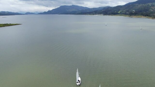 Drone Flight over the Tomine lagoon with sailboats in Colombia
