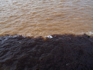 The Encontro das Águas (Meeting of the Waters) refers to the confluence of the Rio Solimões with...