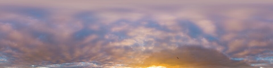 Sunset sky with bright glowing pink Cumulus clouds. Seamless spherical HDR 360 panorama. Full zenith or sky dome in 3D, sky replacement for aerial drone panoramas. Climate and weather change.