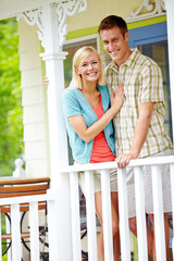 Happy man, woman and portrait on patio for hug, relationship growth and love at home. Couple, smile and support on porch for commitment, marriage trust and weekend relax in Australia neighborhood