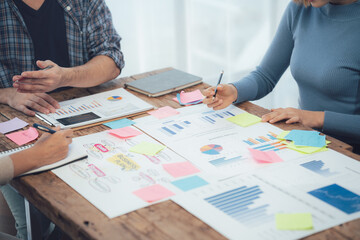 Collaborative Brainstorming: A close-up shot of a team engaged in a brainstorming session,...