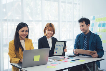 Collaborative Business Strategy: A diverse team of professionals collaborates on a strategic project, analyzing data, brainstorming ideas, and working together to achieve success.