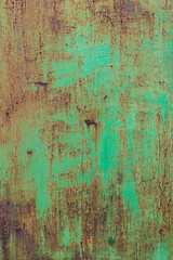 Textur von Rost und abblätterndem Lack in grün.