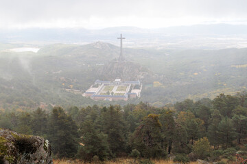 Madrid, Spain - October 17, 2024: Cuelgamuros Valley monumental complex covered by morning fog in...