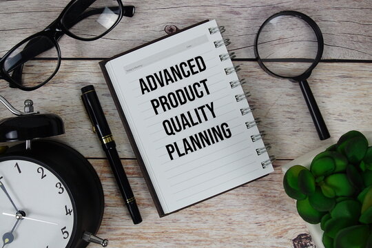 Advanced Product Quality Planning (APQP) text on notepad, Business and Financial concept background