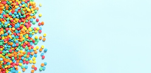 Fototapeta premium Colorful Confetti on a colored background.